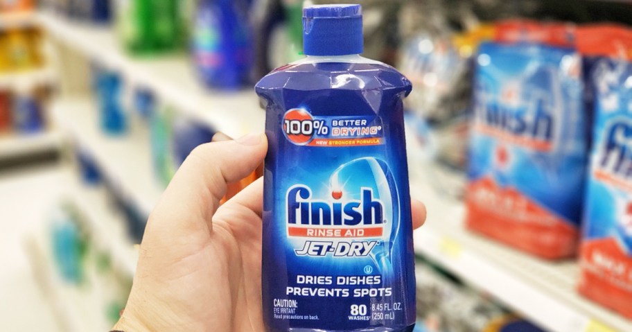 hand holding bottle of finish jet dry