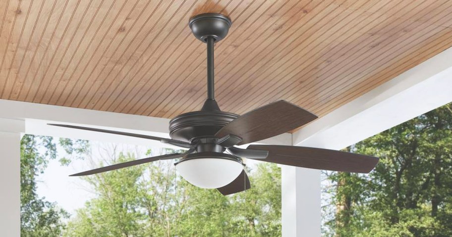 ceiling fan under patio in backyard