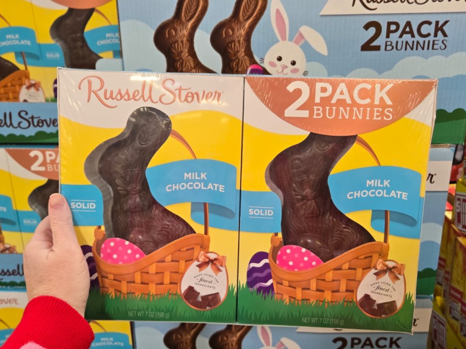 Hand holding russell stover 2 pack bunnies