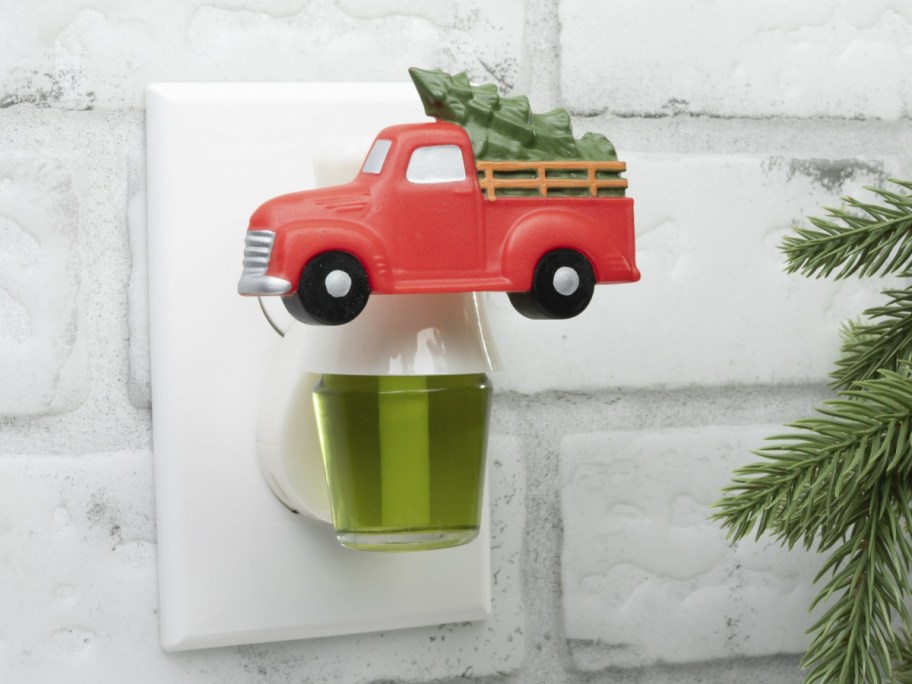 Mainstays Aroma Accents Fragrance Plug - Red Truck displayed on the wall