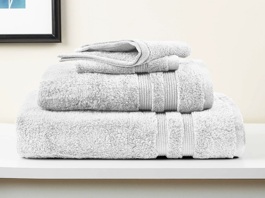 stack of folded grey towels