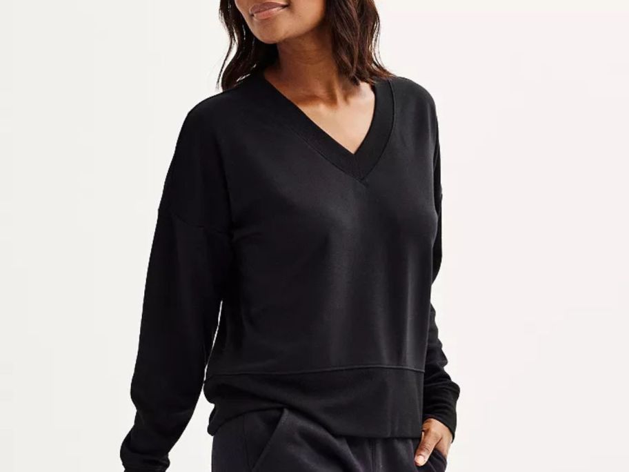 woman wearing a Women's Tek Gear Stretch Fleece V-Neck Pullover