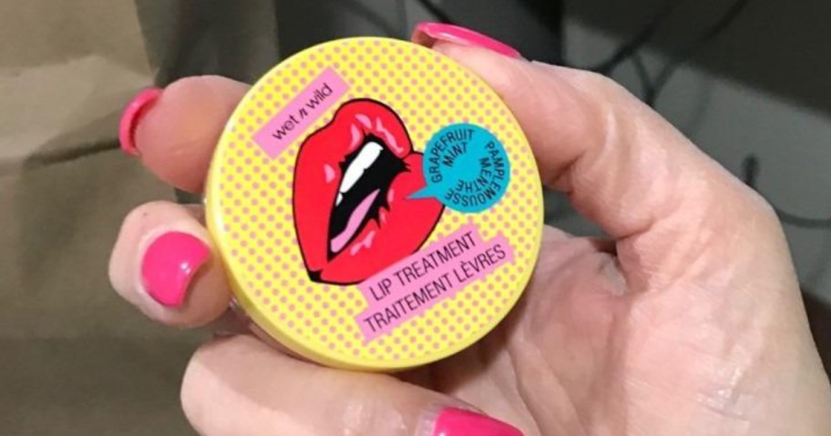 hand holding a Wet n Wild Perfect Pout Hydrating Lip Treatment