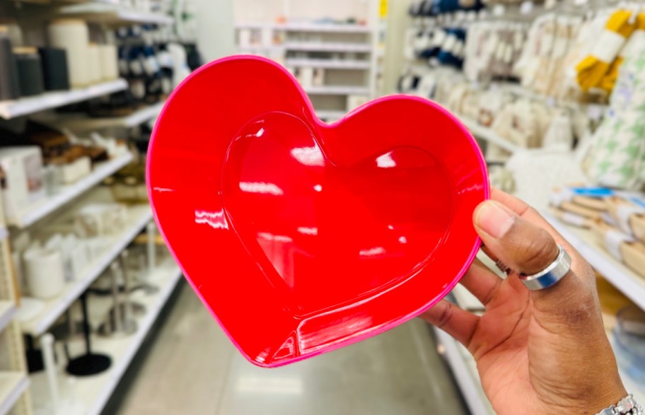 hand holding heart bowl