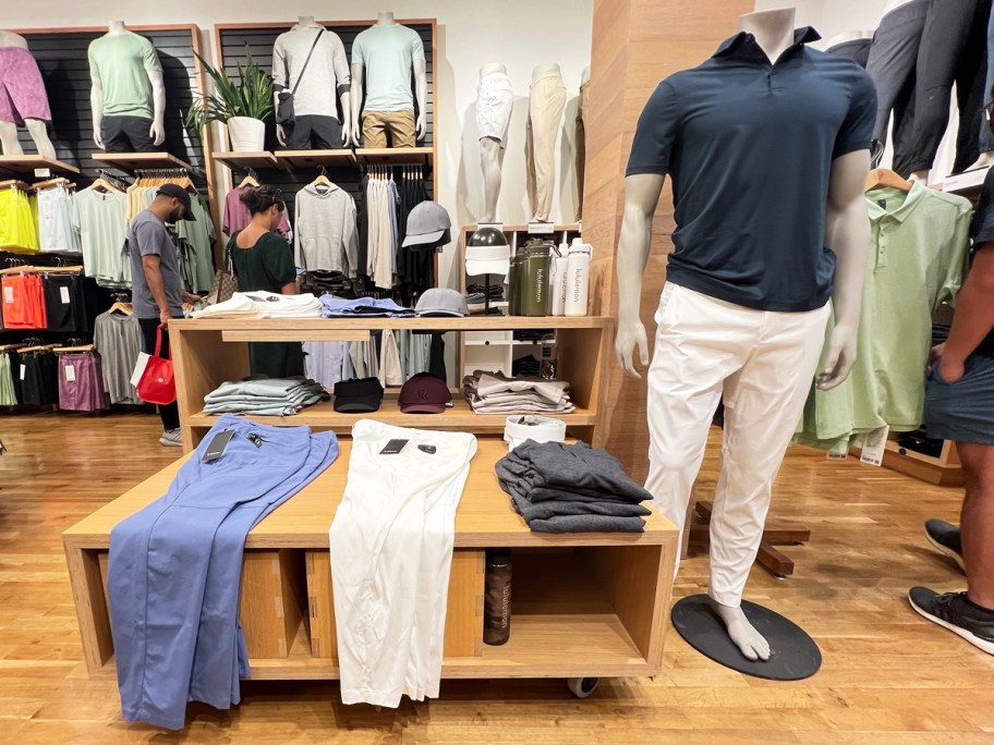 men gold clothing on display in lululemon store