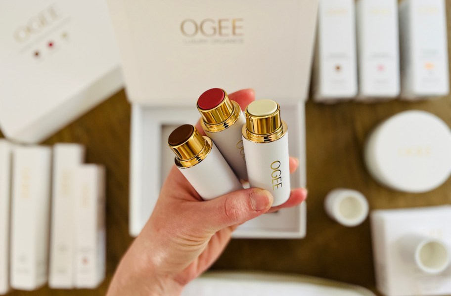 hand holding ogee contour sticks