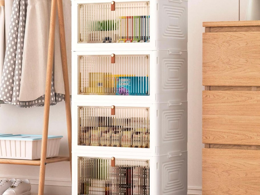 white and clear 4 tier plastic storage bin full of products in bedroom