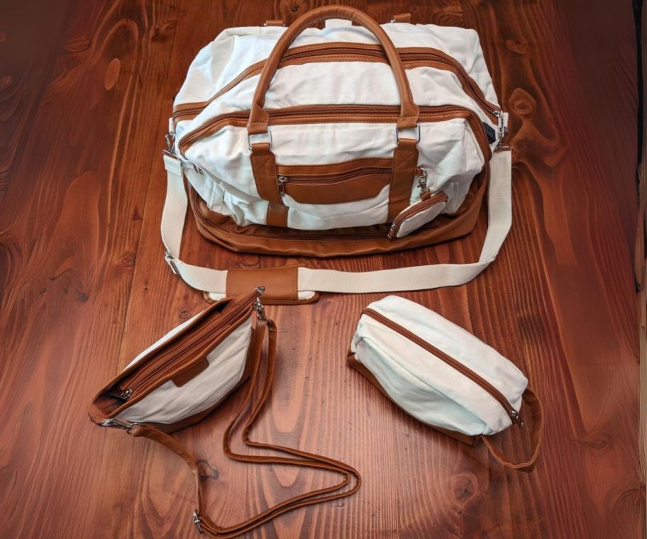 travel duffle set shown with bags and extra straps