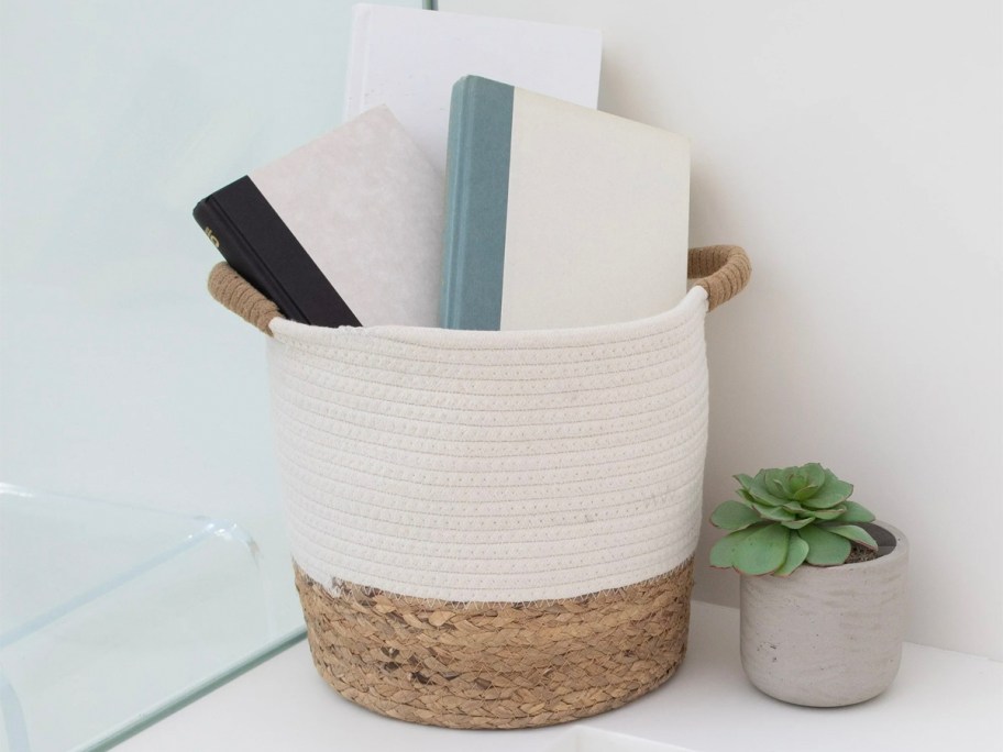 white basket full of books 