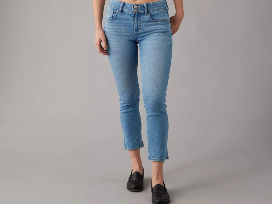 woman wearing american eagle jeans