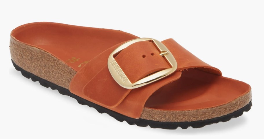 women's Birkstenstock slide with one large buckle in a burnt orange color