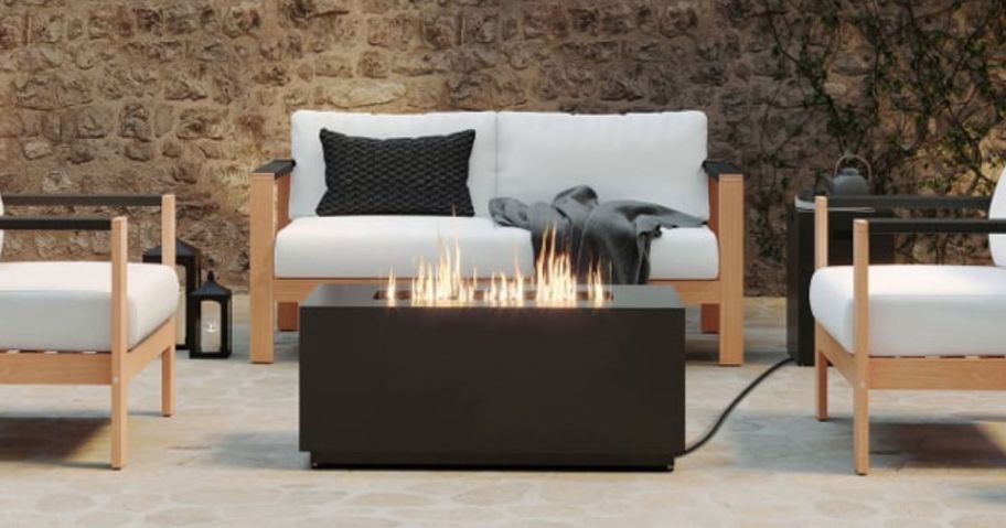 Better Homes & Gardens Rectangle Gas Fire Pit on patio