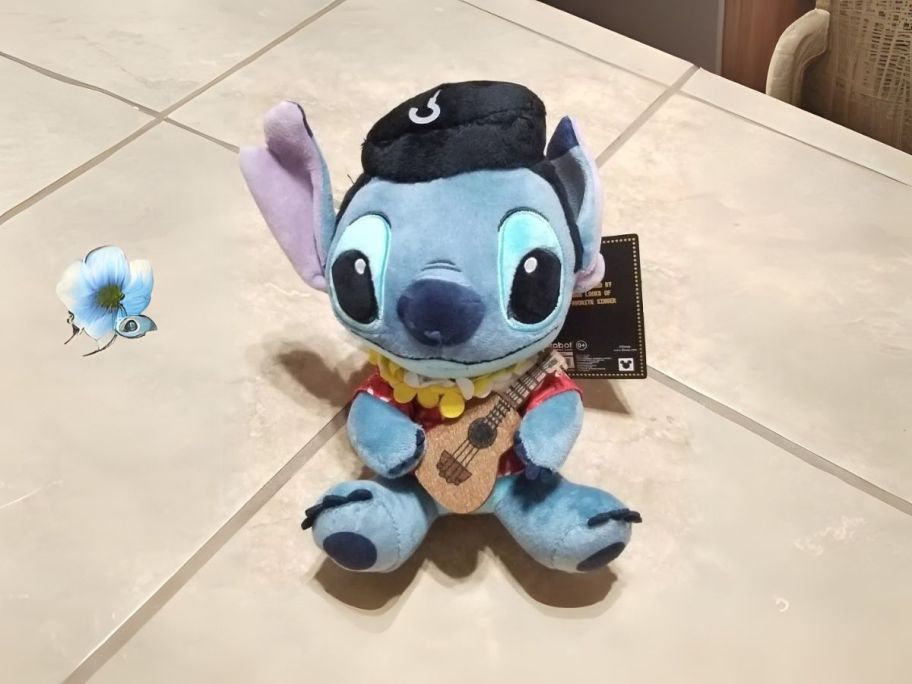 Disney Lilo & Stitch Blue Hawaii Elvis Plush on table