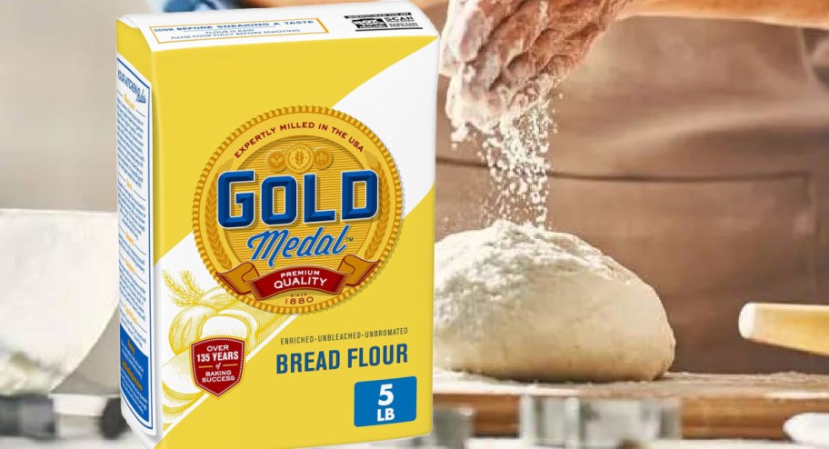 bag of gold metal bread flour bag next to bread being made