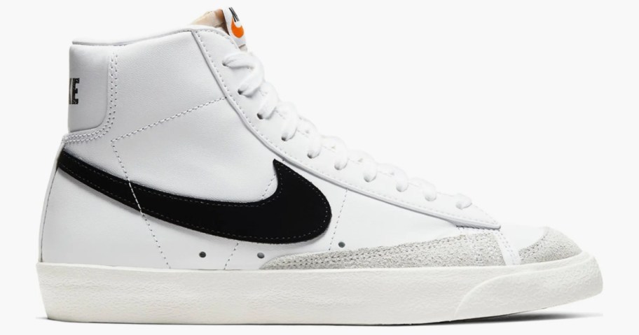 women's high top white Nike shoe with a black swoosh mark