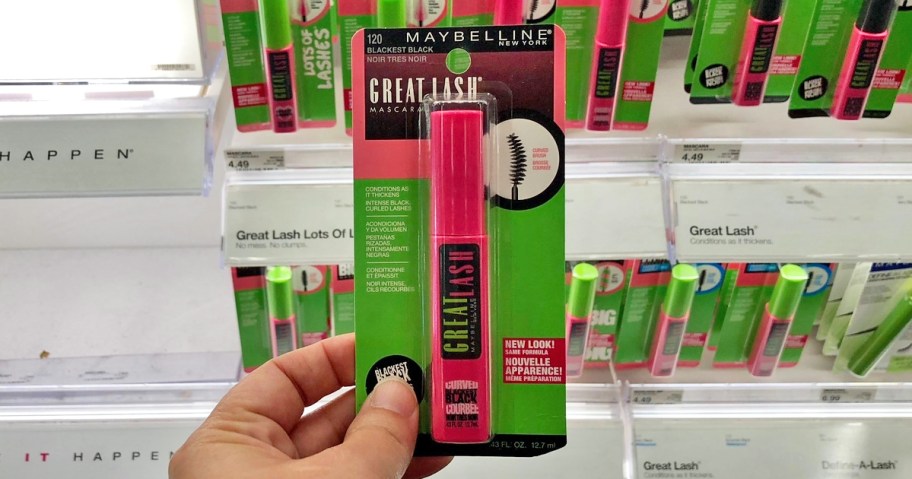 hand holding tube of Maybelline Great Lash Mascara in store