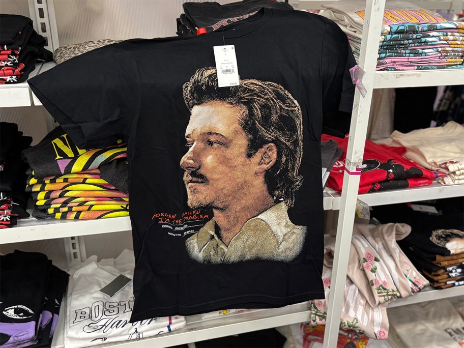 Black Morgan Wallen graphic T-shirt at Target featuring a portrait and the phrase “I’m the problem” displayed on a store shelf.