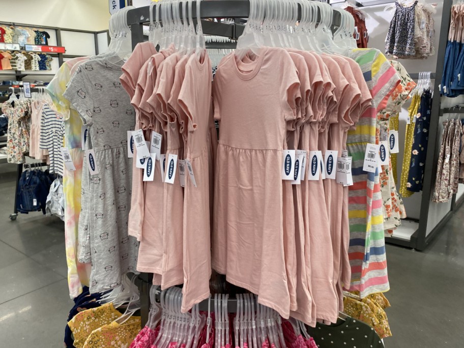 Old navy display of toddler dresses