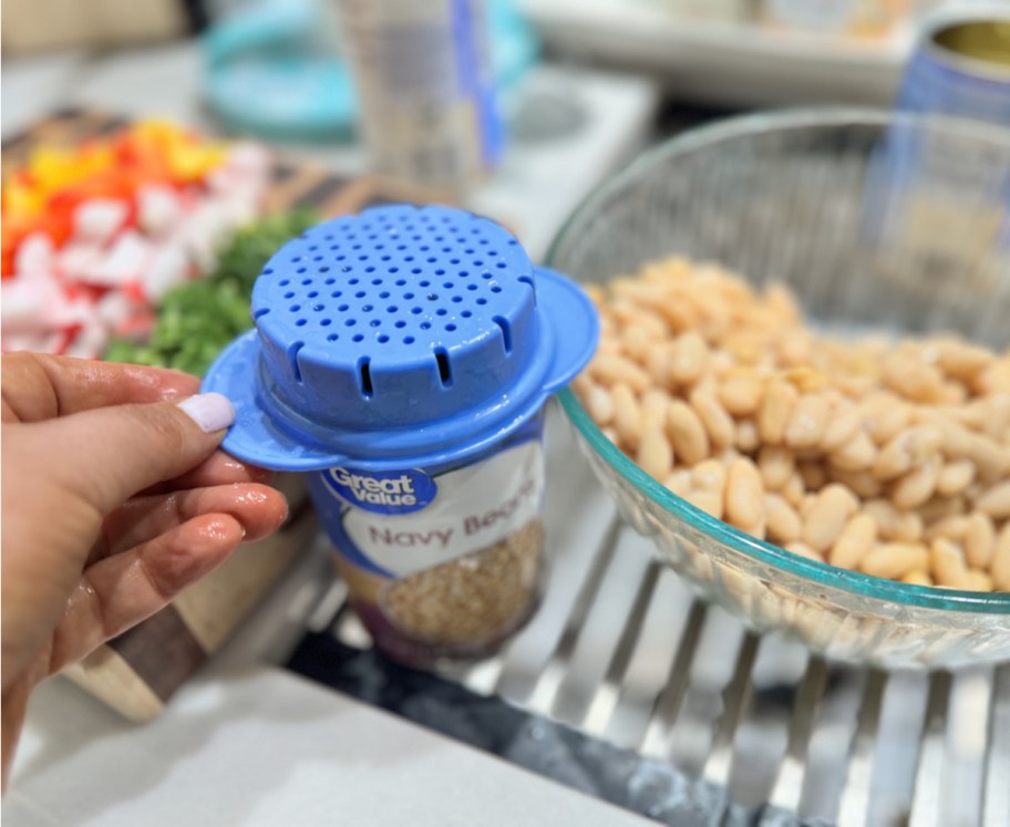 Prepwork can collander on a can of beans