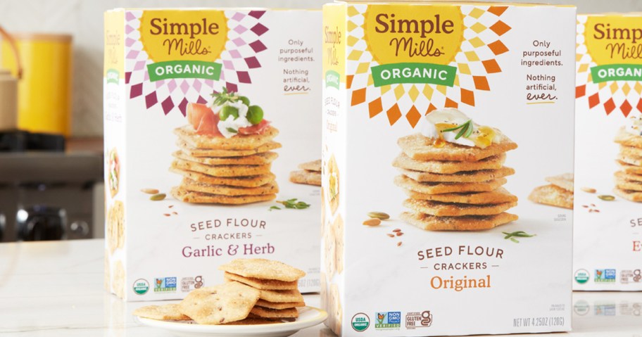 boxes of Simple Mills Organic Seed Crackers on counter