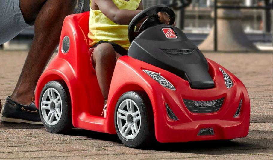 a red toddler ride on car