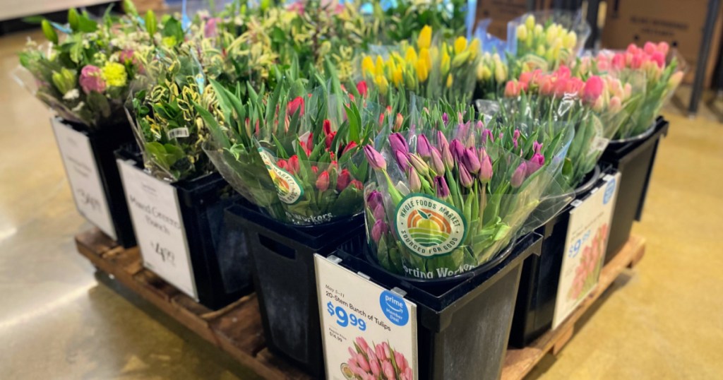 tulip bunches on display in whole foods market
