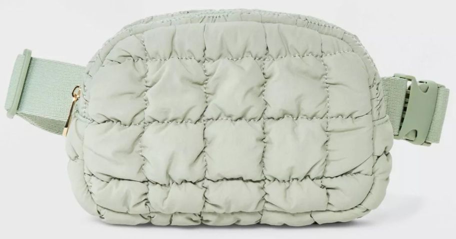 A puffy, green belt bag