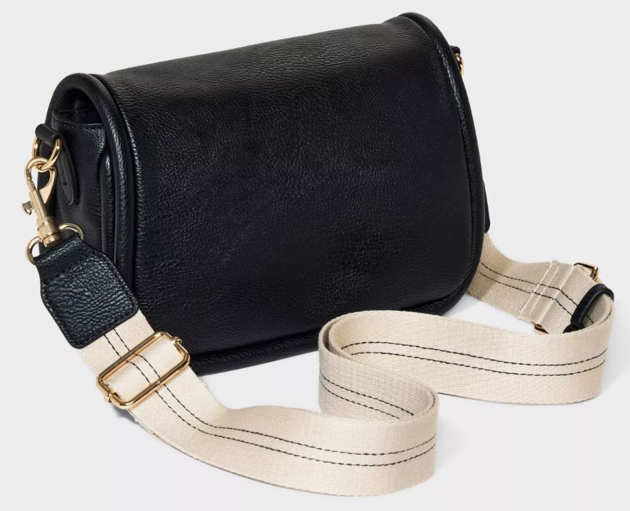 a black crossbody hand bag