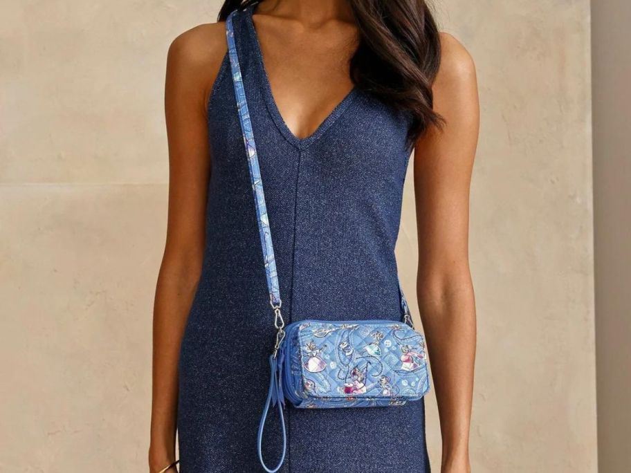 Woman wearing a Vera Bradley Cinderella All in One crossbody