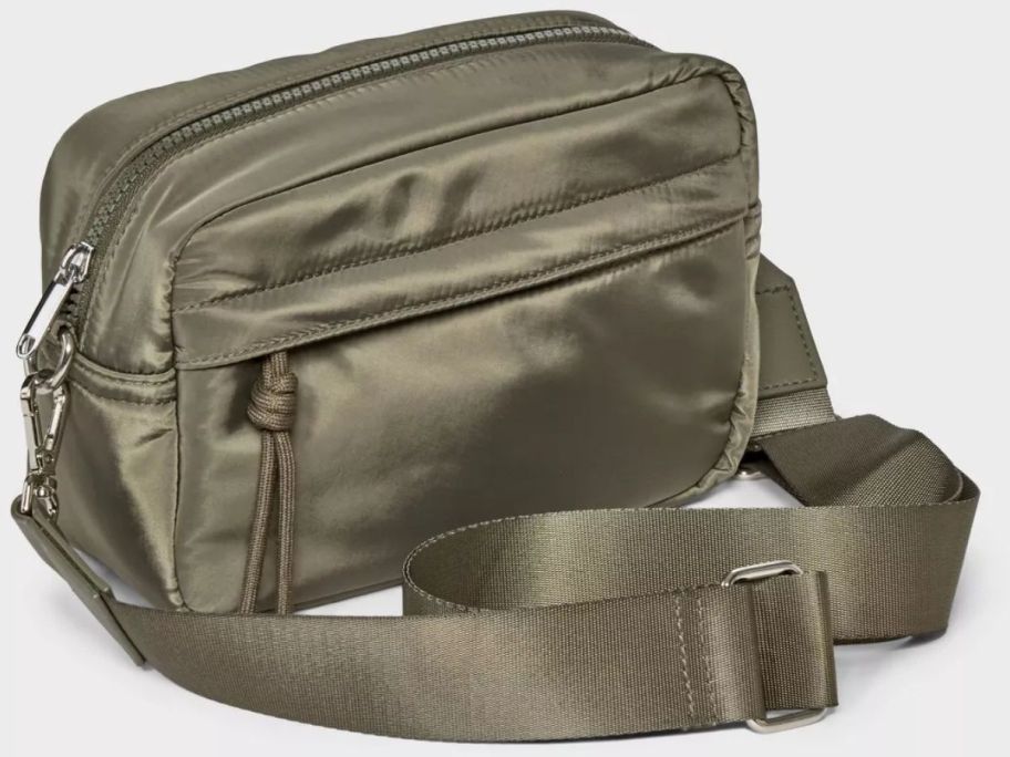 A shiny, green belt bag