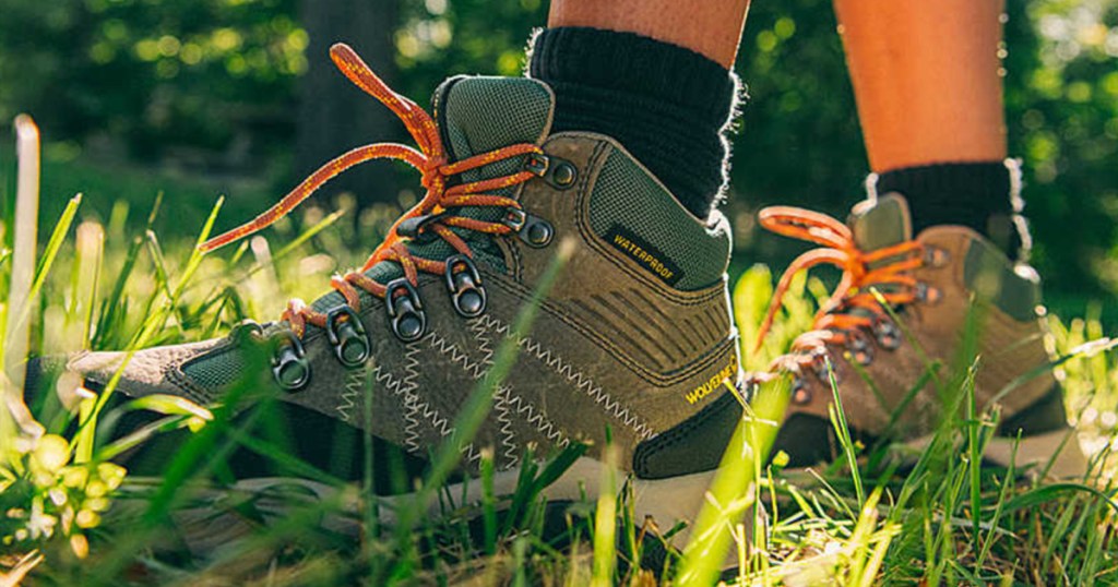 woman wearing wolverine hiking boots outside