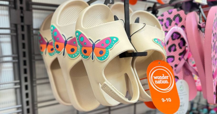 Wonder nation girls slides hanging on a rack at Walmart