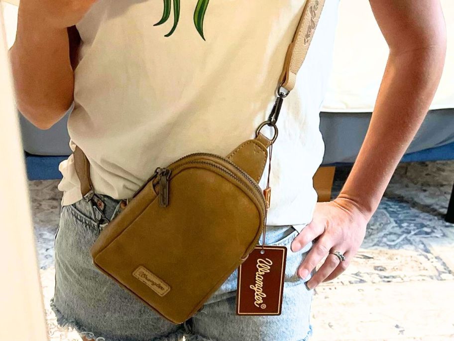 Woman wearing a Wrangler Crossbody Bag