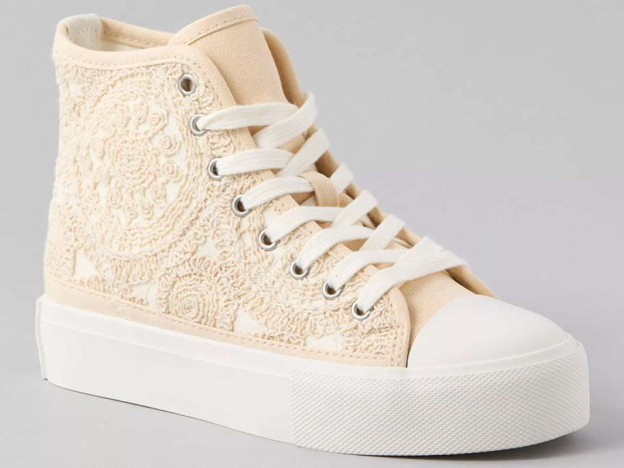 white high top crochet shoe