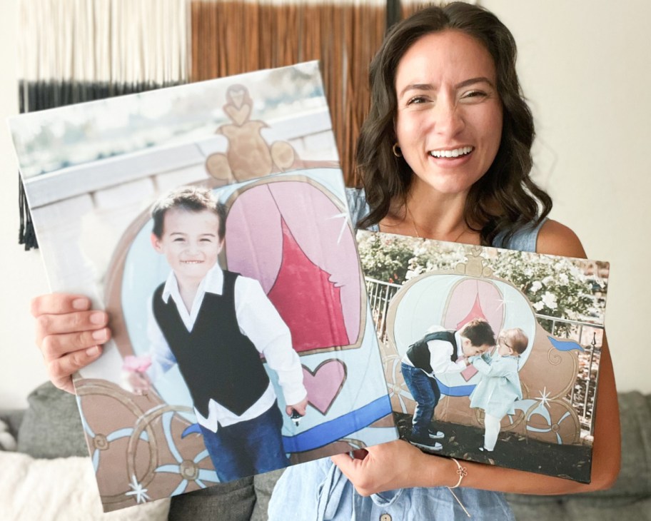 woman holding two canvases