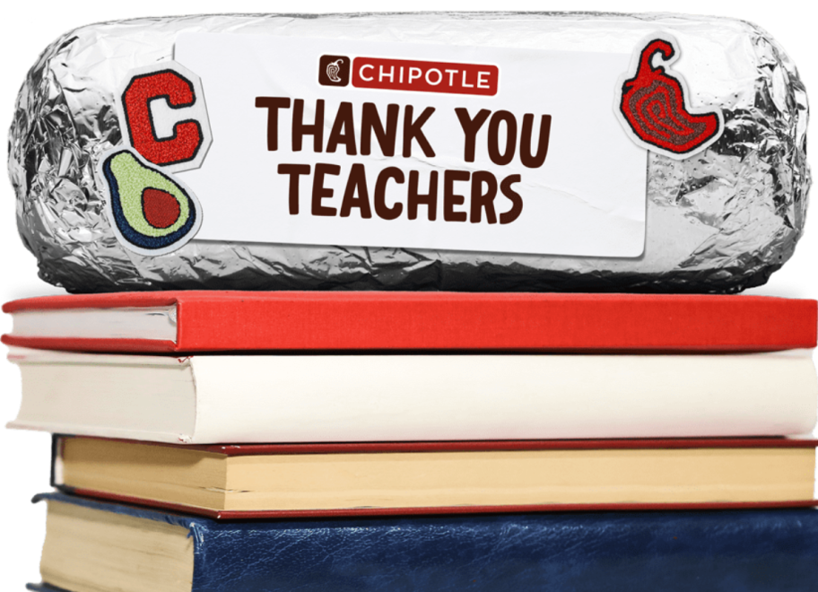 foil-wrapped burrito on a stack of books