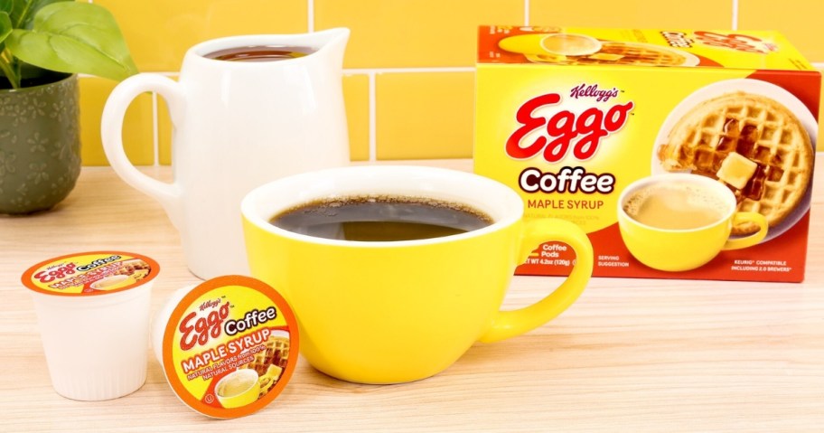 yellow cup of coffee next to Eggo Waffle K-Cup and box of Eggo Waffles Coffee pods