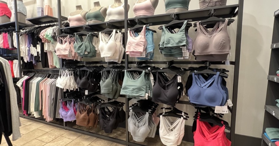 lululemon sports bras hanging in store