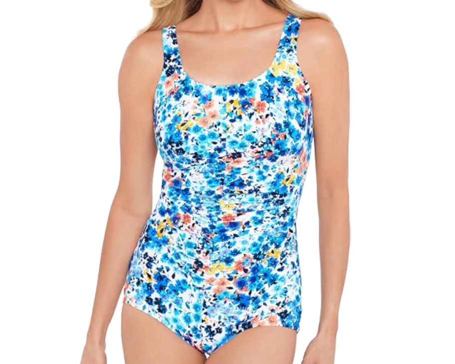 woman in blue and white floral swimsuit