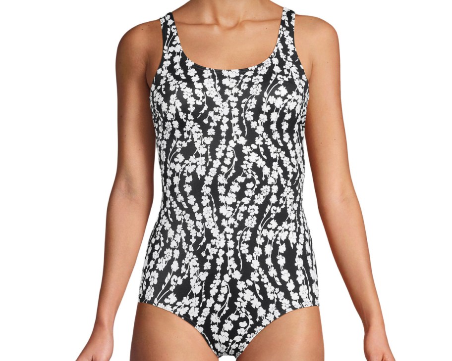 woman in black and white design swimsuit