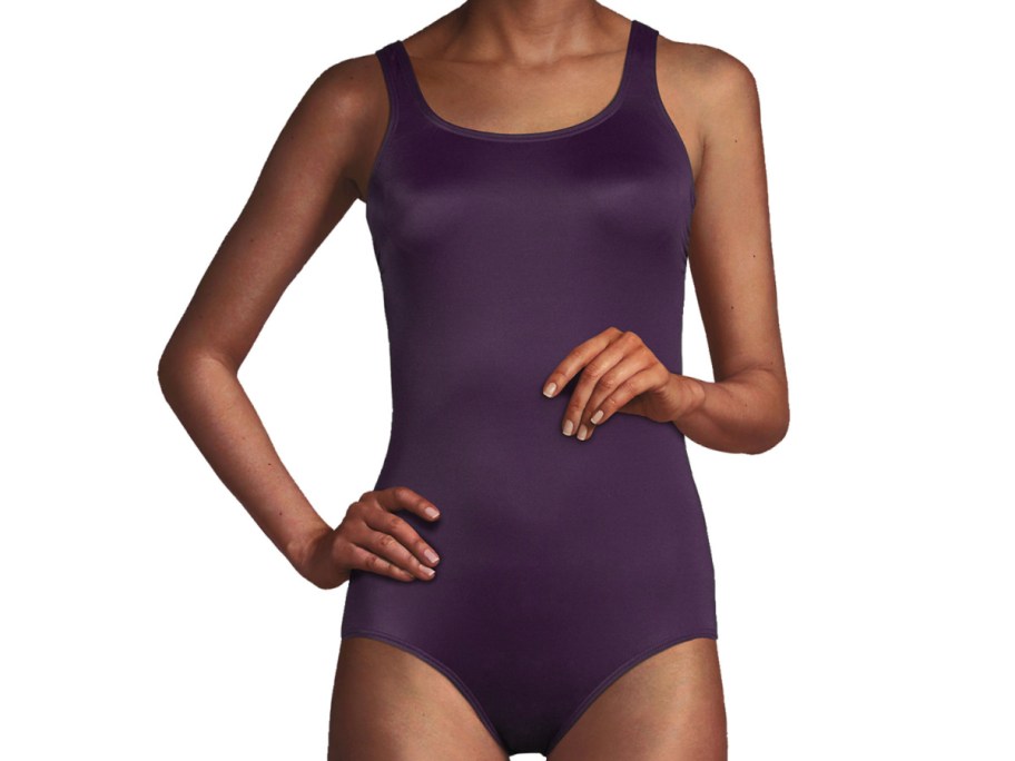 woman in dark purple swimsuit