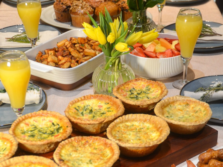 table set for brunch with mini quiches
