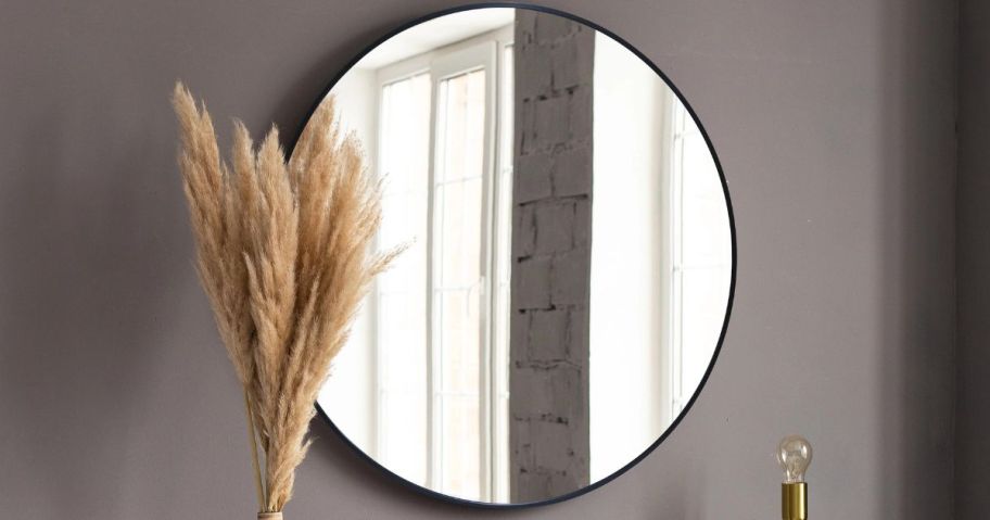 Better Homes & Gardens Wall Mirror Round, 28IN Diameter, Black Finish in foyer