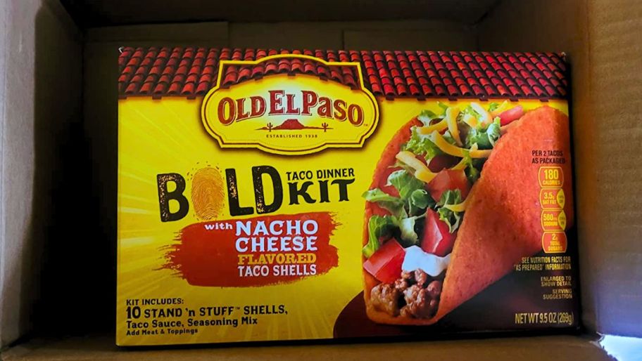 a nacho cheese taco shell kit in a cardboard delivery box