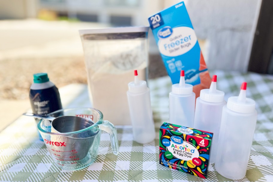 squirt bottles flour shaving cream and water for DIY puffy paint
