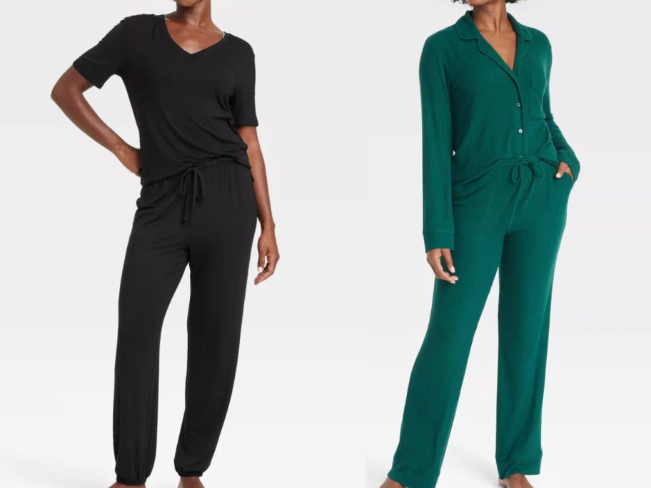 woman wearing a black v-neck long sleeve pajama top and black pajama jogger pants next to a woman wearing a long sleeve green button up collar pajama top with matching pajama pants