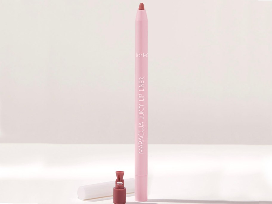 tarte lip gloss sitting standing upright on table