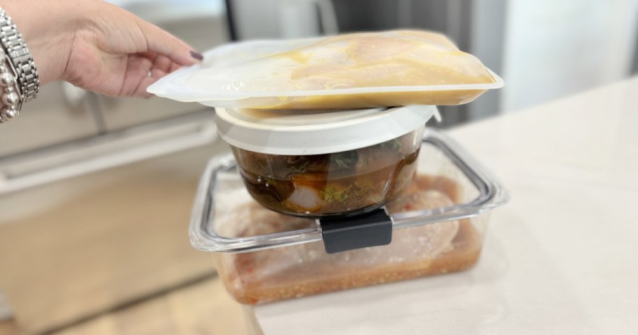 three sets of chicken marinades on the counter