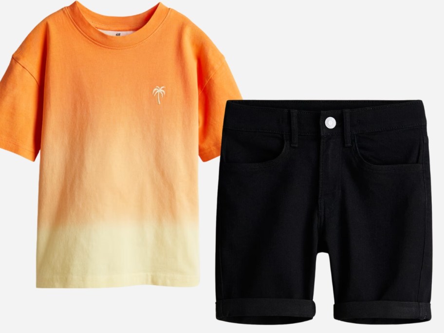 boys orange and yellow tshirt and boys black shorts