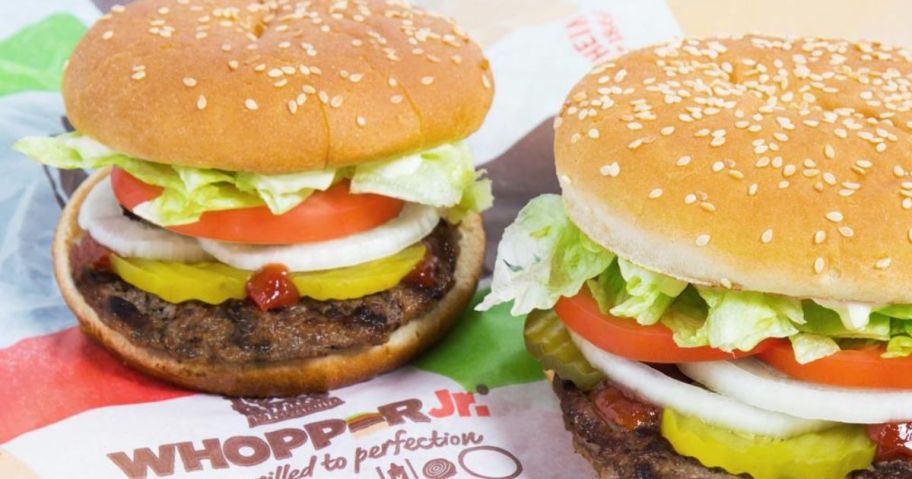 A whopper Junior and a whopper on a tray at Burger King